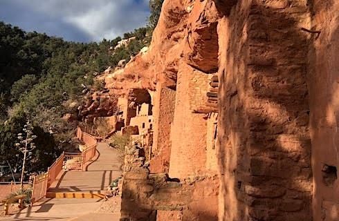 Ancient cliff dwellings in the side of a mountain
