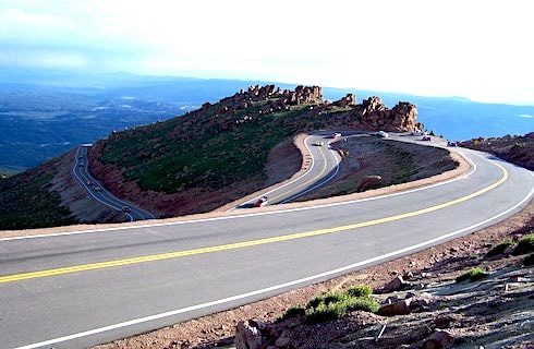Winding paved road at the top of a mountain peak
